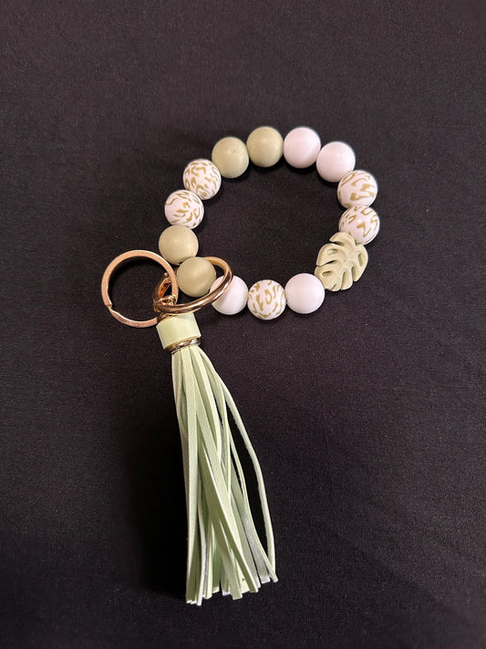 Beaded Plant Themed Key Chain. Elastic with metal links. Monstera Leaf